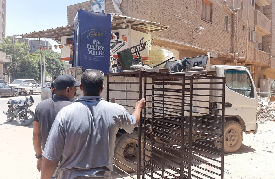 إزالة ٢٥ حالة اشغال إعلانات وكاوتش بحي جمرك الإسكندرية