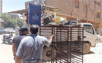  إزالة ٢٥ حالة اشغال إعلانات وكاوتش بحي جمرك الإسكندرية 