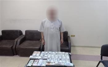 صاحب محل ملابس يمارس نشاط اجراميا في الاتجار بالنقد الاجنبي 