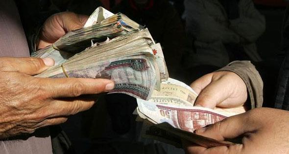 سقوط تاجر عملة فى قبضة مباحث أسيوط 