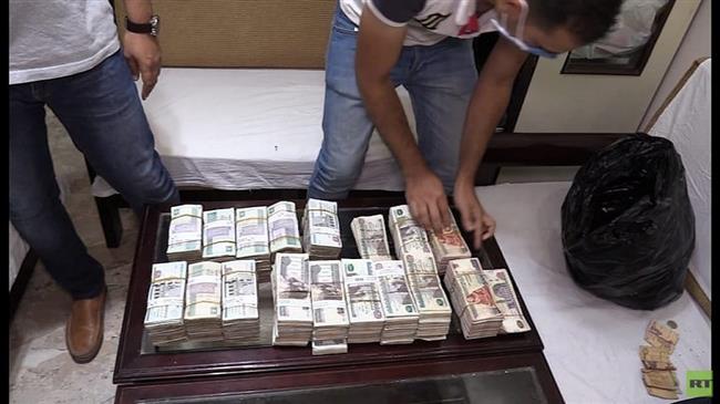 سقوط عصابة تجار العملة بأسيوط 