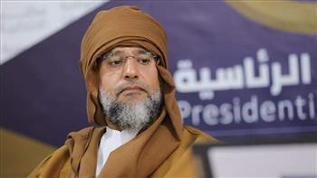   «القذافي» يحث الليبيين لاستلام بطاقاتهم الانتخابية 