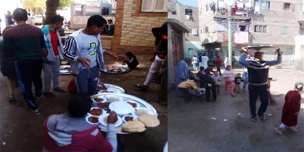 احتفال قرية بنجع حمادي بنهاية الطاعون بإقامة موائد طعام