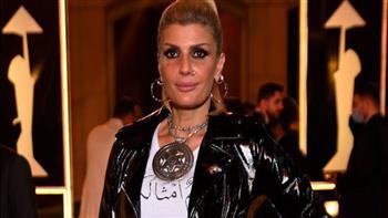 آية قرآنية على فستانها.. فيدرا المصري تكشف صاحبة إطلالتها بـ القاهرة السينمائي
