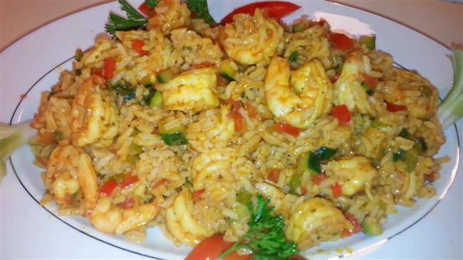 طريقة عمل أرز بالكاليماري والجمبري