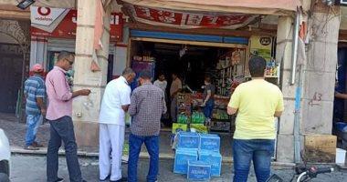 حملات مكثفة بالشوارع لتطبيق قرارات غلق المحال والمقاهى فى دمياط