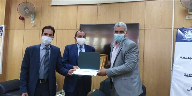 جامعة بنى سويف تكرم الزميل رمضان أبو إسماعيل 