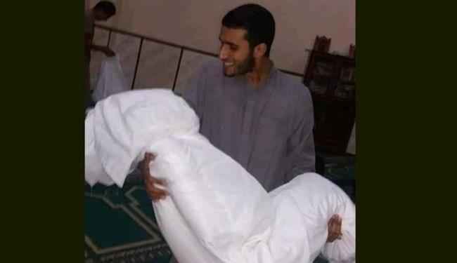 أجهزة الأمن تكشف حقيقة صور شاب يضع صديقه حيا داخل كفن