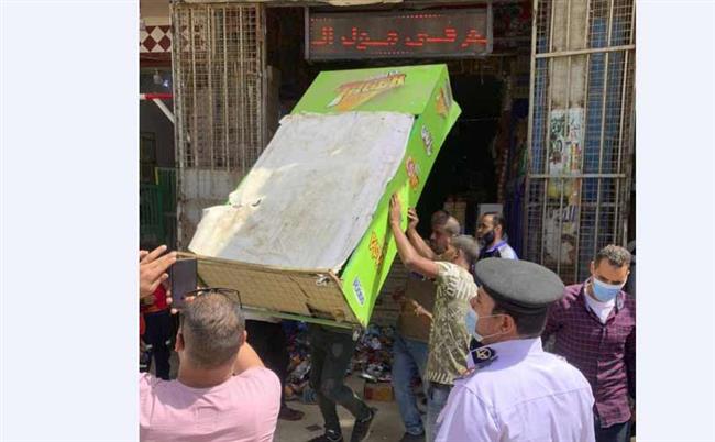 استمرار حملات الضبط ورفع الإشغالات بحي العجوزة