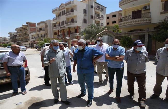 رئيس جهاز بني سويف الجديدة في الشارع مع السكان