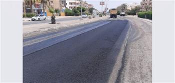 رفع كفاءة وتطوير الطرق بالحي الثالث فى العاشر من رمضان