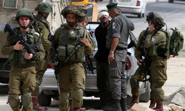 الاحتلال يعتقل 14 فلسطينيا في الضفة الغربية