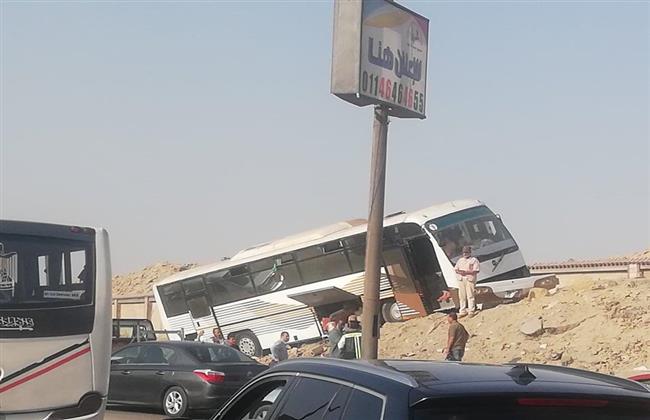 بالصور.. إصابة 3 فى إنقلاب أوتوبيس بطريق أوتوستراد حلوان 