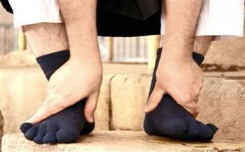هل يجب تدليك القدم باليد في الوضوء؟