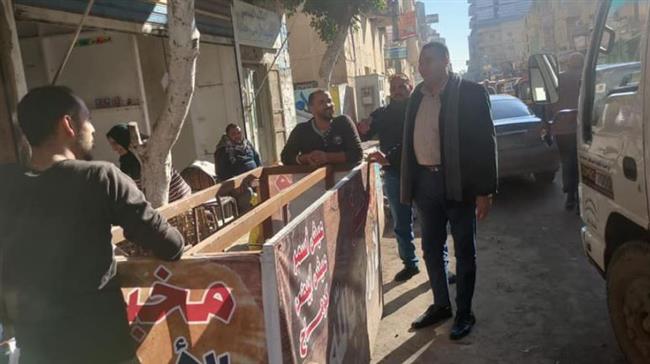 إزالة الإعلانات المخالفة ورفع الإشغالات وصيانة أعمدة الإنارة بشوارع بيلا