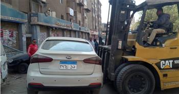  الجيزة: تكثيف حملات رفع السيارات المتهالكة من الطريق العام 
