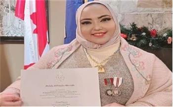 مصرية تحصل على الميدالية البلاتينية للملكة إليزابيث