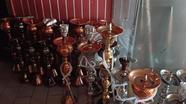التحفظ على 50 شيشة داخل مقاهى مخالفة بأحياء شرق ووسط الإسكندرية