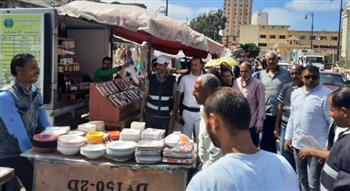 حملة بميدان محطة مصر  تسفر عن رفع 30 حالة إشغال 