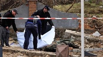   الشرطة الأوكرانية تدفن 150 شخصًا فى مقبرة جماعية