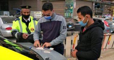 حملات مكثفة بمحاور القاهرة والجيزة لرصد مخالفى قواعد المرور