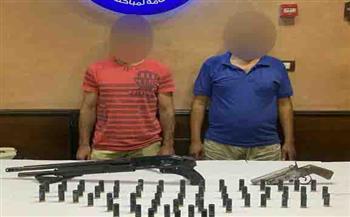 ضبط شخصين بالقاهرة بحوزتهما أسلحة نارية وذخائر