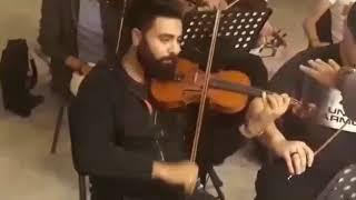   حفل موسيقى لعازف الكمان هشام عامر على مسرح النهر بالساقية