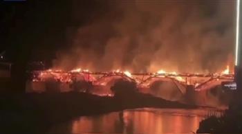   انهيار جسر خشبى عمره 900 عام جراء حريق فى الصين