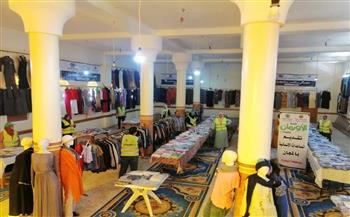   تنظيم معرض ملابس بالمجان وتوزيع 3000 قطعه ملابس بقرية بمركز أبو حمص 