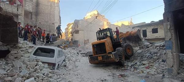 وفاة 11 شخصا جراء انهيار بناء مخالف بسوريا