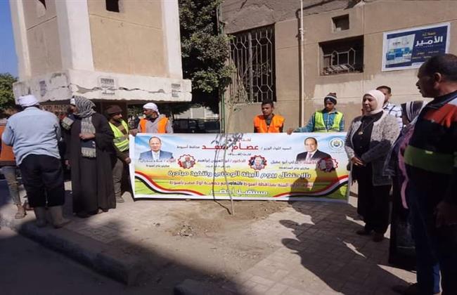 الجمعيات الأهلية بأسيوط تشارك حى غرب أسيوط في زرع أشجار بالشوارع داخل نطاق الحي 