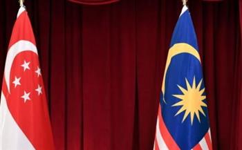   سنغافورة وماليزيا توقعان ثلاث اتفاقيات للتعاون الثنائي