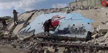   فنانان سوريان يرسمان بفرشاة الأمل على حطام الزلزال في جنديرس