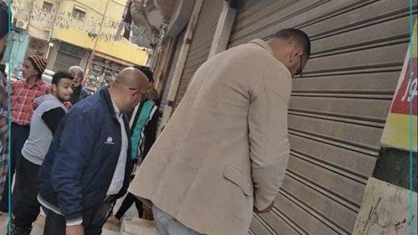 غلق مغسلة بالإسكندرية لتعديها على الطريق العام