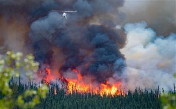    هطول الأمطار يساعد في تنقية الهواء من دخان حرائق الغابات بكندا