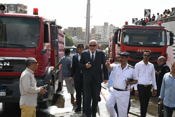 بالصور "الداودي "يتفقد أعمال السيطرة على حريق هائل اندلع بمحطة وقود بقنا