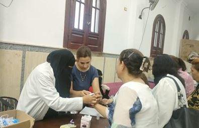 حملة "100 يوم صحة" تقدم خدماتها بكنيسة ماري مينا بكفر الشيخ