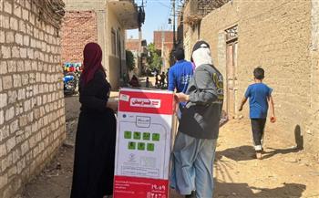 قافلة خيرية لتقديم المساعدات للأسر الأولى بالرعاية بسوهاج