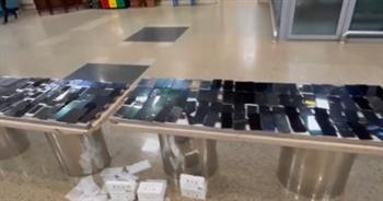   ضبط ركاب حاولوا تهريب تليفونات وشاشات ومخدرات بمطار القاهرة