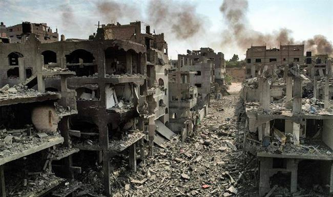 استشهاد 12 فلسطينيا وإصابة العشرات في قصف إسرائيلي على قطاع غزة