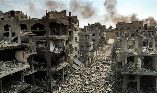 استشهاد 12 فلسطينيا وإصابة العشرات في قصف إسرائيلي على قطاع غزة