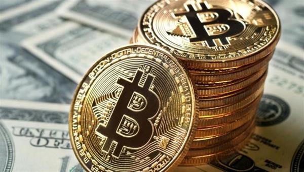 "البيتكوين" تتجاوز حاجز 100 ألف دولار لأول مرة