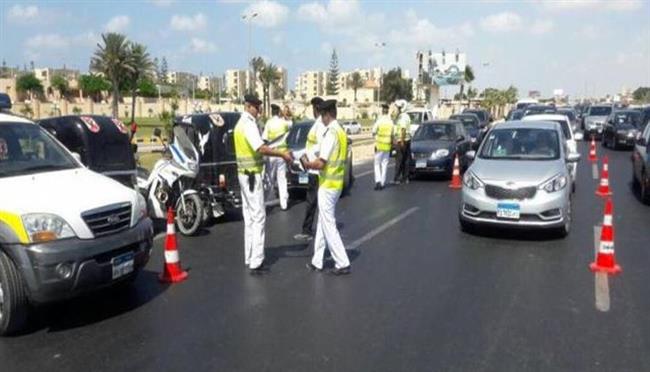 حملات مرورية بمحاور القاهرة الكبرى لضبط المخالفين