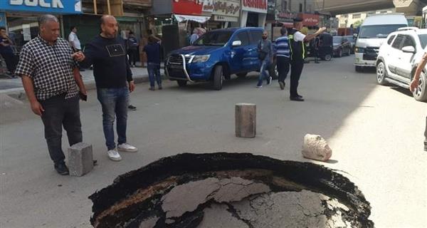 إصلاح هبوط أرضى بشارع 15 مايو بشبرا الخيمة