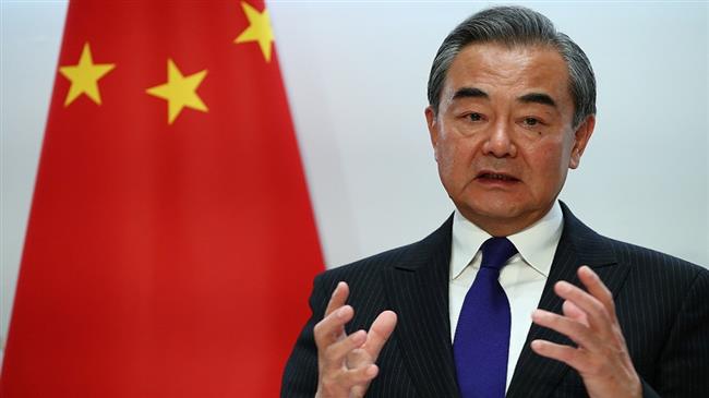 وزير الخارجية الصيني يدعو لحماية السلام والأمن العالميين وإعطاء زخم للحل السياسي