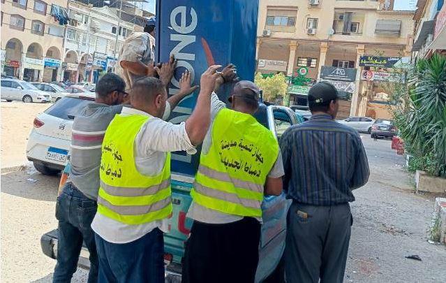 حملة مكبرة لإزالة الإشغالات بالمنطقة المركزية في دمياط الجديدة