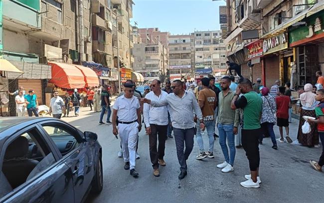 الجيزة .. إزالة إشغالات المحال التجارية و الباعة الجائلين بمنطقة فيصل 