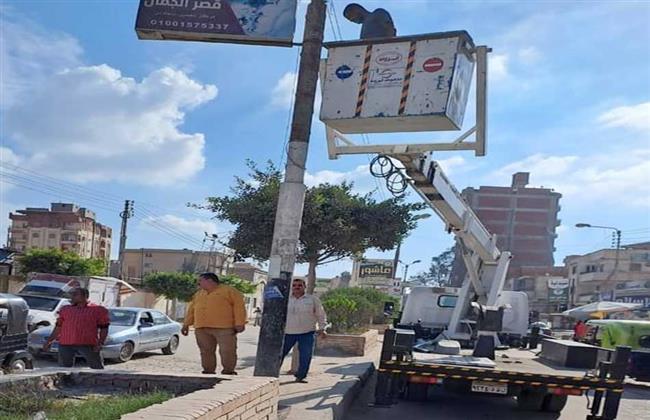 إزالة 11 إعلان وكشك مخالف بحى وسط الإسكندرية 