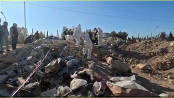    اكتشاف 163 جثة بـ4 مقابر جماعية في درعا بسوريا 