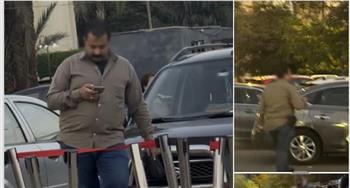   كشف ملابسات مقطع فيديو يتضمن تتبع شخص لآخر بسلاح ناري داخل دار الأوبرا